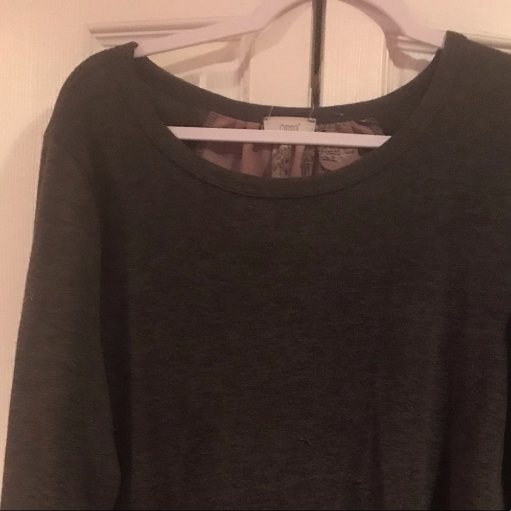 Gray sweater with floral fabric on back